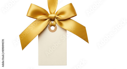 Festive gold ribbon bow with a blank rectangular tag for gift embellishments