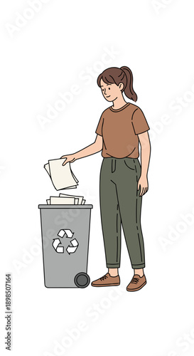 Young woman recycling paper into a bin at home indoors  