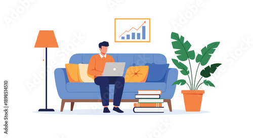 Comfortable home office setup with a man working on a laptop while sitting on a blue sofa, surrounded by books, a plant, and a lamp.
