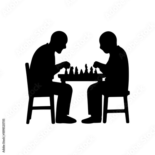 Two people playing chess concentrating on strategy game