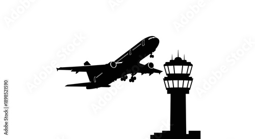 Commercial airplane taking off near airport control tower