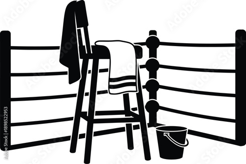Corner of a boxing ring, with a stool, towel, and a bucket.