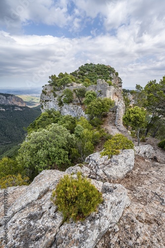 Old castle walls on mountain top, Castell Alaró castle ruins, Puig dAlaró, Serra de Tramuntana, Majorca, Spain