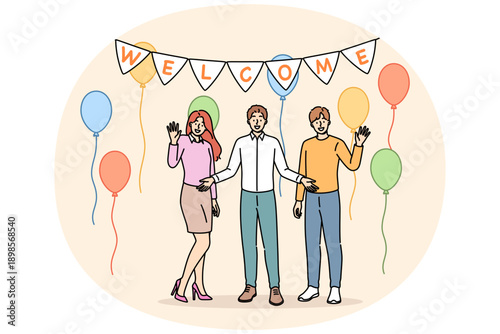 Welcome party from happy family welcoming friends into new apartment with balloons to celebrate move. Welcome party for employee who got job at company and became member of business team