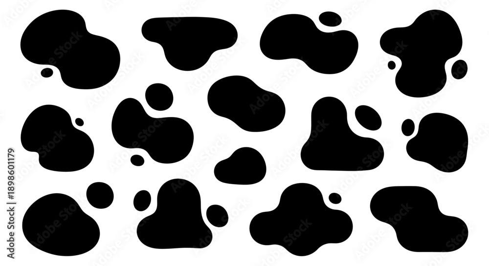 Fototapeta premium Set of black ink blotches and organic shapes on a white background.