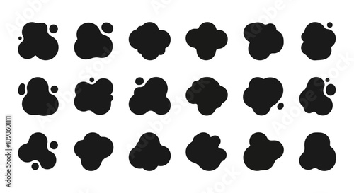 Abstract black ink blot shapes and liquid stains set.