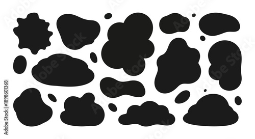 Abstract black ink blot shapes and paint splatters set.