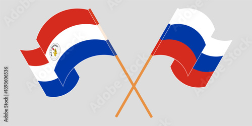 Crossed and waving flags of Republic of Paraguay and Russia. Vector illustration