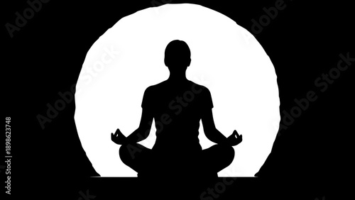 Silhouette of a person in yoga lotus position meditating against a vibrant circular sunset, concept of mindfulness, peace, and wellness