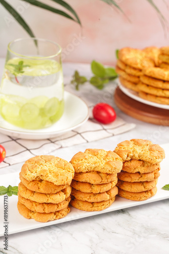 Delicious Walnut Cookies with Refreshing Lime Water and Fresh Mint