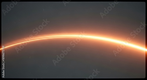 Dynamic Orange Light Streak on Dark Background.