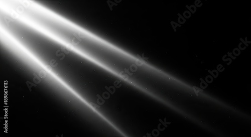 Abstract Light Rays on Black Background.
