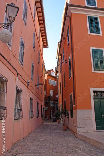Narrow collorful cobblestone street in Rovinj. Rovinj is historic old town in Istria, on the Adriatic coast of Croatia