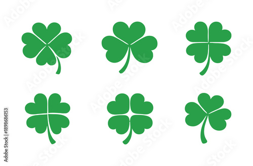 Set of green four-leaf clover icons in flat vector style. Collection of lucky shamrock symbols for St. Patrick's Day design.
