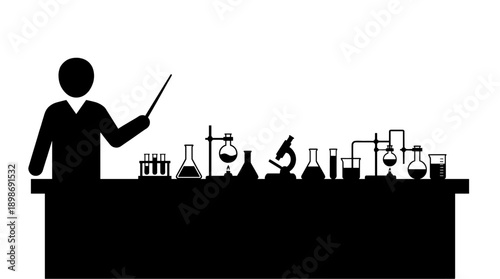 A silhouette of a professor teaching in the lab