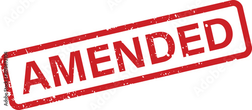 A red rectangular rubber stamp mark with the word AMENDED centered on a white surface