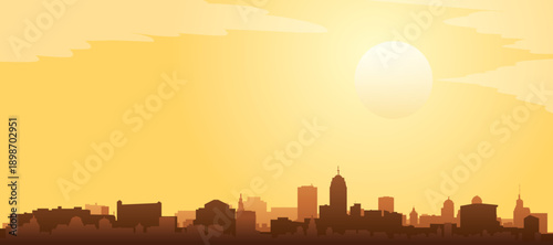 Golden yellow panoramic poster of the city skyline with misty background buildings and clouds of LANSING, UNITED STATES
