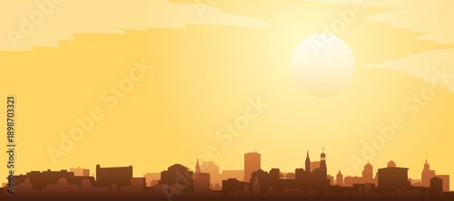 Golden yellow panoramic poster of the city skyline with misty background buildings and clouds of HAMBURG, GERMANY