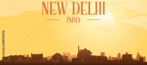 Golden yellow panoramic poster of the city skyline with misty background buildings and clouds of NEW DELHI, INDIA