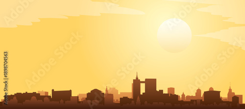 Golden yellow panoramic poster of the city skyline with misty background buildings and clouds of BRUSSELS, BELGIUM