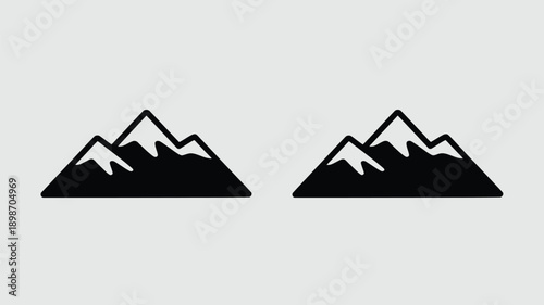 Two black and white mountain icons side by side on a white background isolated on white background, Vector, illustration