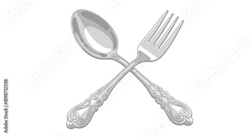 Elegant silverware fork and spoon crossed ornate handles.