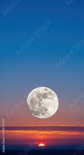 The full moon sets in the pink and orange sky as the sun begins to rise over the distant horizon, creating a beautiful celestial moment, scenic view, astronomy, landscape