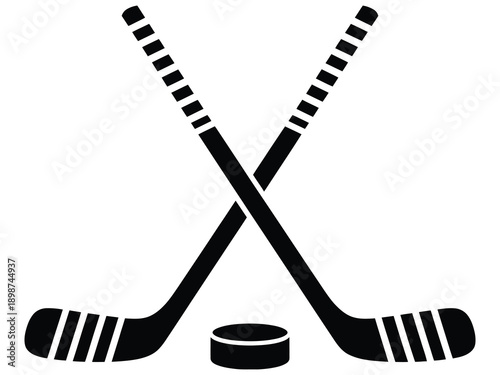 Two crossed hockey sticks and puck icon in black, vector illustration for ice hockey, sports branding, team logos, tournament designs, and athletic promotional materials.