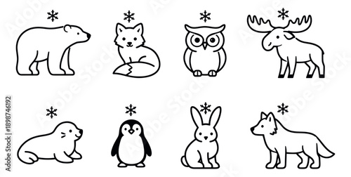 Cute line art winter animals set featuring northern creatures with snowflakes for winter holidays