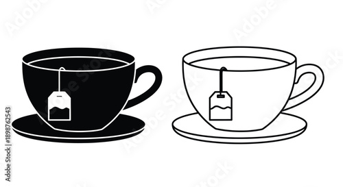 Two teacups with teabags one filled and one empty in black and white