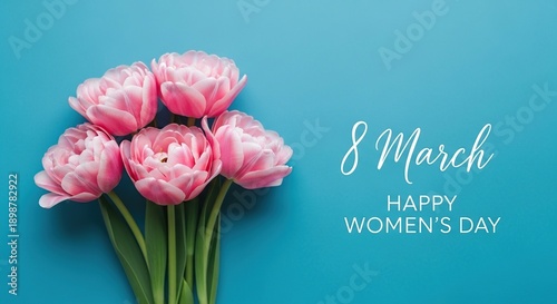 A bouquet of pink tulips with a happy women's day message for international women's day