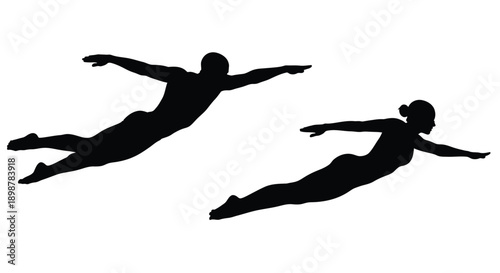 Silhouettes of a boy and girl appearing to fly through the air