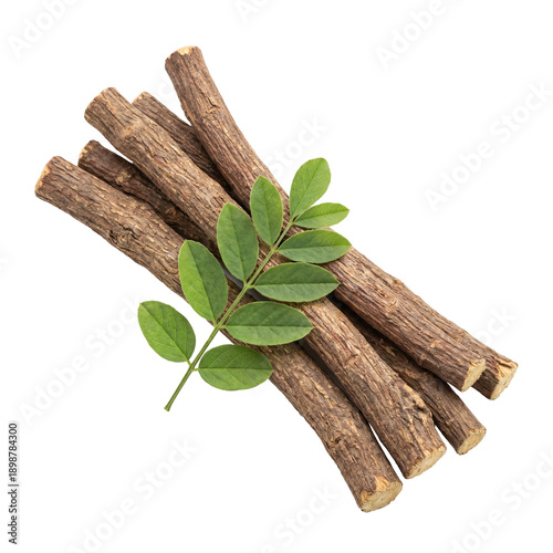 Dried licorice root sticks with fresh green leaves, showcasing natural herbal texture and traditional medicinal plant material used in wellness, tea, and herbal remedies.
