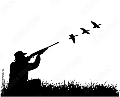 Silhouette of a determined hunter aiming a rifle skyward at three flying ducks in marsh grass