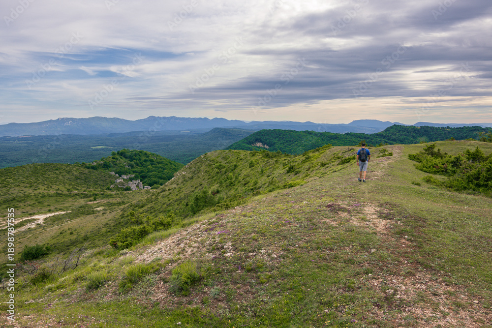 Fototapeta premium Hiking trail near the town of Apellaniz in the Basque Country reaching the top of mountains of San Cristobal and San Justi (Spain)