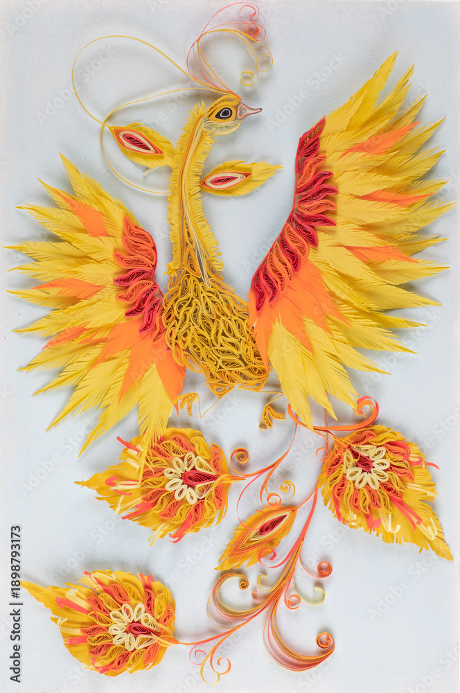 Obraz premium Colored paper firebird in a frame isolated on a white background