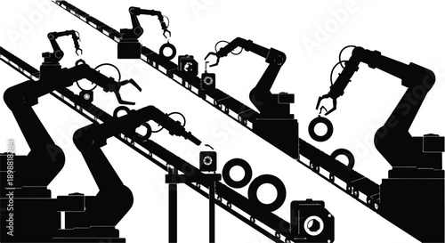 Industrial robotic arms assembling manufacturing production line with conveyor belt and tires in factory setting