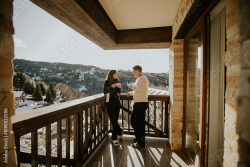 Couple enjoying drinks on b...