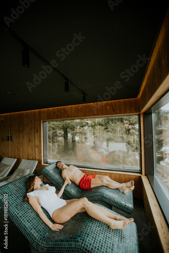 Couple relaxes in a spa wit...