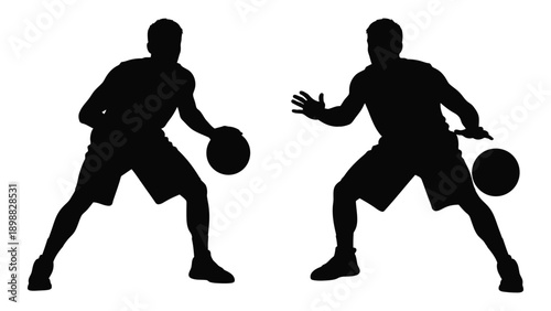 Two silhouetted basketball players engaged in a dynamic game pose