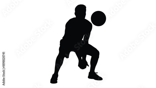 Silhouette of a basketball player dribbling the ball in a dynamic pose
