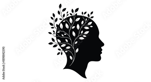 A silhouetted human head filled with branching leaves and foliage