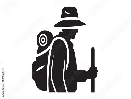 Hiker with backpack and walking stick