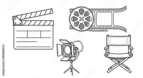 Vintage film equipment collection with clapperboard, reels, and director's chair