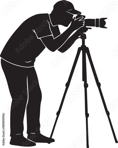 Professional Photographer with Camera on Tripod Silhouettes