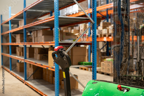 Automated Warehouse with Electric Pallet Truck and Storage Racks