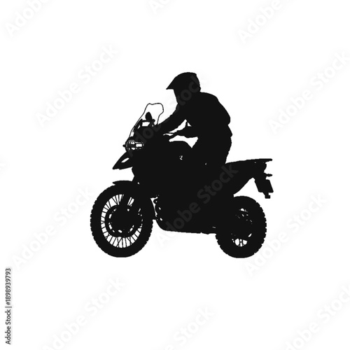 Silhouette of Adventure: A lone rider fearlessly navigates the open road on a powerful motorcycle, silhouetted against a backdrop of freedom.