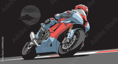 Motorcycle racing on a track with a rider in action.