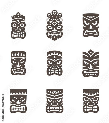 Set of nine tiki mask silhouettes in expressive faces. Polynesian tribal vector design for tattoos, festival art and cultural projects