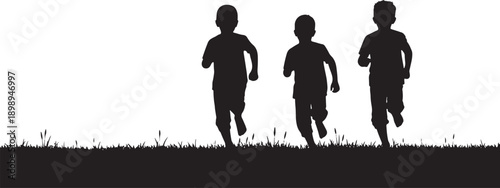 Three boys running across a grassy field at sunset, captured in silhouette, conveying freedom and youthful energy.